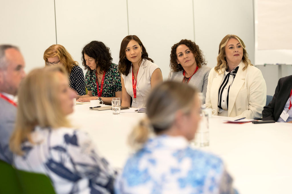 Group of women around a table